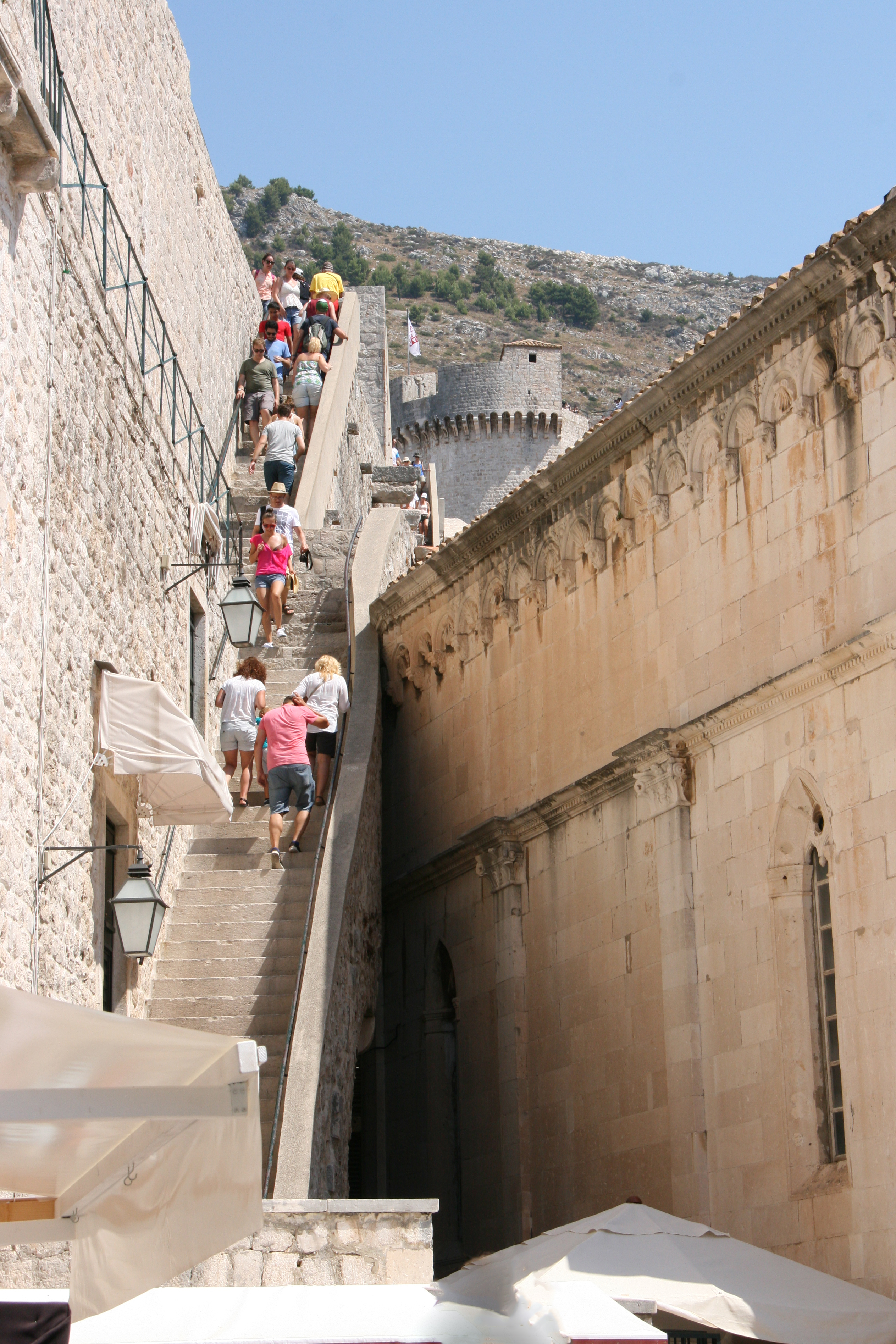 The steep stair you must climb to go up to the city walls.